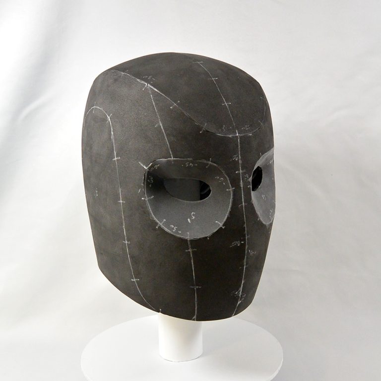Futuristic and minimal helmet or a robot head, made with black EVA foam - cosplay headgear