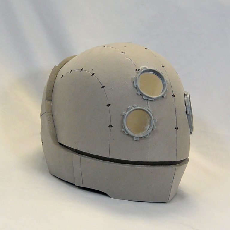 Si fi inspired full head helmet with asymmetrical eye-like lenses on the front panel, made using EVA foam - cosplay item